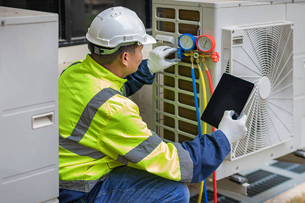 Professional Ductwork Repair technician working in Wellington, FL